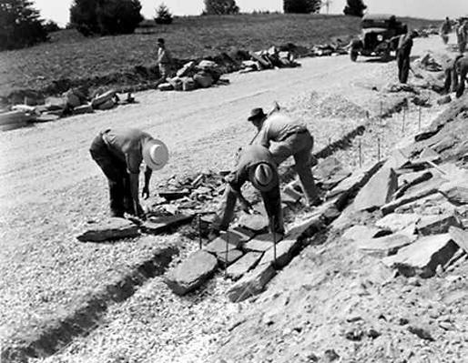 blueridgeparkwaystonecutters.jpg
This 1938 photo from the National Park Service Historic Photographic Collection shows stone cutters laying gutters along side the Blue Ridge Parkway then under construction.

