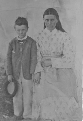 kellymargeryhashsmall.jpg
This photo dates from about 1870 and shows Margery Hash Kelly and her son John Kelly, at age about 7.  Margery's first husband was Peter Kelly, who disappeared in December 1865.  She subsequently married Nathaniel Phipps.
