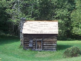 100_0208.jpg
This is the Sheets Cabin located between mile markers 251 and 252 on the Blue Ridge Parkway in Laurel Springs, Ashe Co., NC. The cabin was built c. 1818. (According to the Park Service, the cabin was built by Jesse Sheets in 1818, but Jesse was not born until 1818, so the cabin was likely built by his father, Andrew.)  Courtesy of Ricky Sheets [email]rickysheets@earthlink.net[/email]


