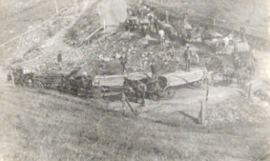 Cleveland - Cleveland Lumber Yard
Horse drawn wagons of lumber crossing mountain from Lebanon to Cleveland to be shipped by rail.   Russell County, VA.
Courtesy of a person who wishes to remain unknown.
