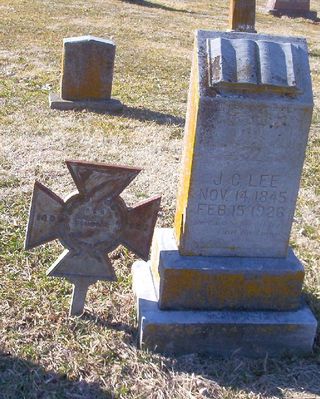 J. Calvin Lee
This grave marker for J. Calvin Lee shows the Confederate Iron Cross.
