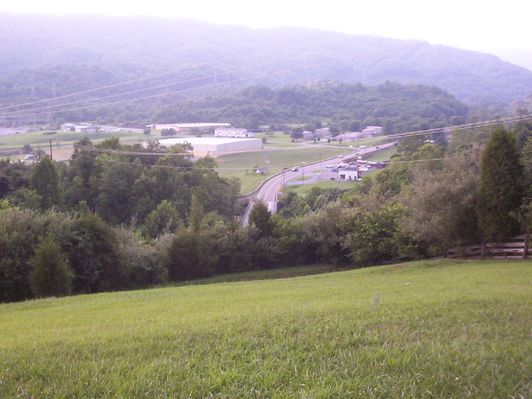 000_0729.JPG
This is an overlook of the scene of the principal battle of Saltville, October 2, 1864.  Note the earthworks at the edge of the tree line about middle of the image.  Photo by Jeff Weaver, June 2005.
