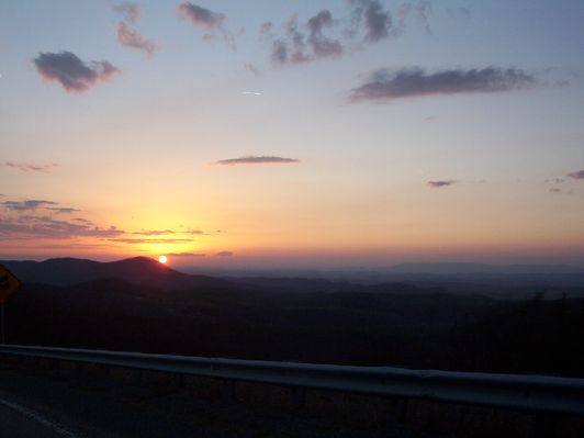 100_1265.jpg
This is a photo of sunset over Clinch Mountain taken from Skull's Gap, between Konnarock and Chilhowie, VA.  Taken 6:25 p.m., March 12, 2006 by Jeff Weaver.
