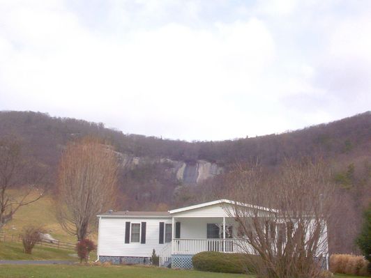 100_1891.jpg
Note the black stripe in the rock behind the house.  Unusual.  Photo by Jeff Weaver, November 29, 2006.
