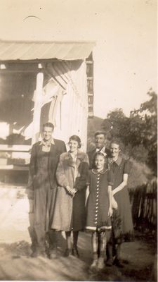 413.jpg
Left to right, Paul Phipps, Ola Mae Phipps Neaves, Sue Lee Phipps (front), Benjamin Franklin Phipps, and Cora Lee Richardson Phipps.  Photo 1938, Weaver's Ford, Ashe County, NC.
