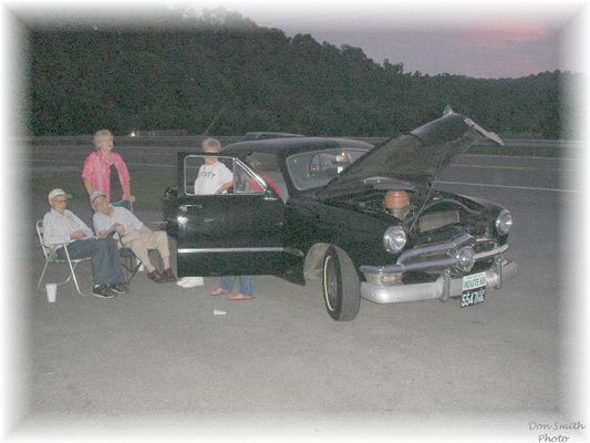 BUCKSDRIVEINCRUISEIN062.jpg
GEORGE FRENCH AND FRIENDS WITH HIS '49 FORD AT THE CAR NUT'S CRUISE IN AT BUCK'S DRIVE IN.
 
SALTVILLE, VA. / AUGUST 5, 2006.  Courtesy of Don Smith [email]dsmith1043@comcast.net[/email]

