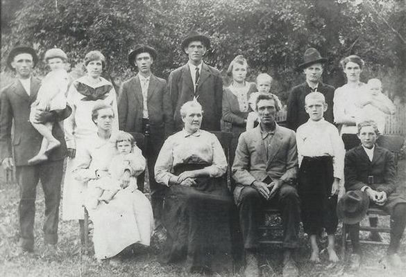 DolphandBaneyKilbySpencer.jpg
Identification of the Baney and Dolph Spencer phot.  Back row (l to r): Glen Spencer holding Clara, Wave Spencer Spencer, Wave's husband Ora Spencer, Lonnie Spencer, Vennie Rash Spencer holding Von, Brack Osborne (husband of Belzona Spencer), Belzona Spencer Osborne holding Helen.  Front row (l to r): Hester Spencer Spencer holding Ola, Urbana "Bany" Kilby Spencer, Adolphus "Dolph" Spencer, Ralph Spencer, Claude Spencer.  Courtesy of Danny Miller [email]millerd@fuse.net[/email]
