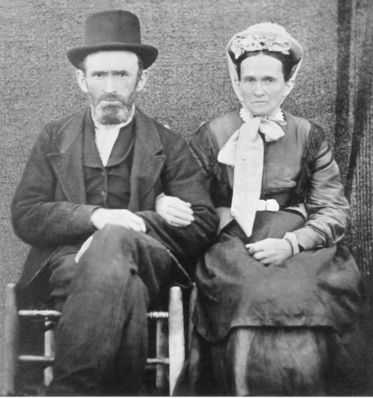 Osborn, Enoch Burton
Enoch Burton Osborn III b 15 Jan 1826, d 14 May 1883 Grayson Co. VA and Irena (Cox) Osborn b 1 Oct 1829 Grayson Co. VA, d 21 Apr 1912 Madison Co. NE. They had 14 children! This picture was taken before Enoch Passed away, in May 1883. 
Courtesy of Donna (Collier) Dietrich [email]dietricd@fyi.net[/email]



