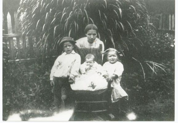 Click to view full size image
==============
Grandma Medley
Grandma Medley (Margie Alice Carpenter) with Ernest Everett Medley, Baby Clema Frances Caudle and Rose Emma Caudill, taken in 1916.
Grandpa Medley (Thomas Jefferson) made the picket fence and they are in front of a huge Pampas grass plant that he got somewhere in his travels and planted in the yard. Mom said that he took really good care of his yard. This was on Mitchell's River, inside what is now the Reynolds Estate ...Mom said neighbors would get the "flowers" from the Pampas Grass to use for dusters..
Grandma Medley
Grandma Medley (Margie Alice Carpenter) with Ernest Everett Medley, Baby Clema Frances Caudle and Rose Emma Caudill, taken in 1916.
Grandpa Medley (Thomas Jefferson) made the picket fence and they are in front of a huge Pampas grass plant that he got somewhere in his travels and planted in the yard. Mom said that he took really good care of his yard. This was on Mitchell's River, inside what is now the Reynolds Estate ...Mom said neighbors would get the "flowers" from the Pampas Grass to use for dusters..