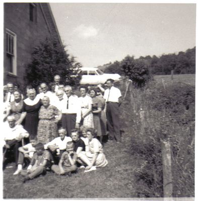 Perkins Family Group
Here is a group of Perkins relatives at Kathleen or Winnie Perkins' home years ago.  I hope someone can help me with dates and who they all are.  Courtesy of Cathy Bell [email]cjbell47@goldenwest.net[/email]

