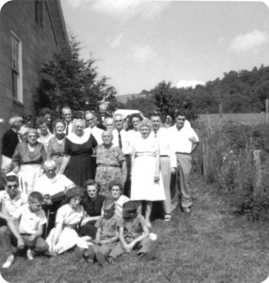 Perkins Family Group
Here is another picture of a family gathering at Kathleen Perkins home years ago.  Anyone know when and who these are?  Courtesy of Cathy Bell [email]cjbell47@goldenwest.net[/email]

