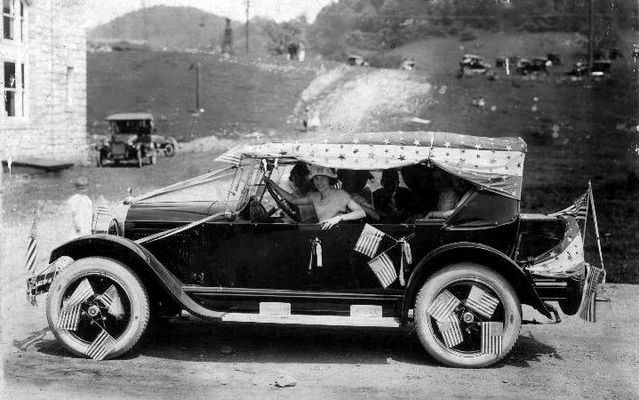 Saltville - Willys Knight Car on the 4th of July
JULY  4th  IN  SALTVILLE,  VA.  /  CIRCA  1925



THE  CAR  IS  A  1924  WILLYS  KNIGHT  COUNTRY  CLUB  (DELUXE  TOURING.)
 
THE  PICTURE  WAS  TAKEN  AT  A  JULY  4th  CELEBRATION  IN  SALTVILLE,  VA.  CIRCA  1925.
 
THE  FIRST  NATIONAL  BANK  IS  IN  THE  BACKGROUND.
 
WILLYS  KNIGHT  WAS  MANUFACTURED  BY  OVERLAND  FROM  1914  TO  1933.
 
THE  CAR  WAS  OWNED  BY  JOHN  CAMPBELL  WHO  LIVED  ON  EASY  STREET.
 
THE  YOUNG  LADY  DRIVING  IS  IRENE  ROGERS  WHO  ALSO  LIVED  ON  EASY  STREET. 
 
THE  PHOTOGRAPHER  IS  UNKNOWN  BUT  WAS  PROBABLY  C.  L.  TOTTEN,  TOM  TOTTEN'S  DAD,  WHO  HAD  A  PHOTO  SHOP  ACROSS  THE  STREET  AT  THE  TIME.  Courtesy of Don Smith [email]dsmith1043@comcast.net[/email]
 

