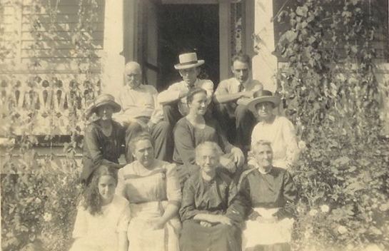 Maggie Kilby Pennington (center facing right)
Maggie Kilby Pennington is in the center facing right.  Courtesy of Danny Miller [email]millerd@fuse.net[/email]
*****
(bottom row) Mary Kilby, her mother Callie Pennington Kilby, Almeda  Grubb Pennington, Orlean Pennington Young; (middle) Linnie Lawrence  Pennington, Maggie Kilby Pennington, Martha Pennington Sturgill (top  row) Cicero Pennington, unknown (could he be I. R. Kilby, Callie's  husband???), Dent Pennington.  Further indentification courtesy of Emily Kilby [email]erk44@verizon.net[/email]

