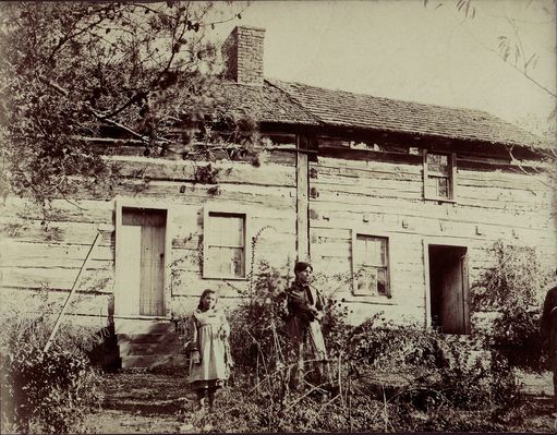 MarionCabin_1901_.jpg
On the back, in my G-Grandmother Marilla Anderson's hand: [and her spelling]

" The house where my Father was born, June 22, 1822 - Marion, Smythe County, Virginia - His sister Maggie and little girl Daisy standing in yard - Nov. [blur] 6th, 1901"

If "Maggie" is William Reese Anderson's sister Margaret, she would be about 64 years old, in this shot.  She looks about right for that age, in that family line. Her brother never did turn gray.
---

Courtesy of Suze [email]moreach@netzero.net[/email]

