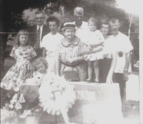 Group at Baptist Chapel Church Cemetery
This picture showsl people at Baptist Chapel Cemetery 
left to right  Juanita Gilbert (child), Mary Brooks (child), Grace Blevins, Alma Blevins Debord, Edith Brooks (child), Irene Deboard Brooks, Earl Debord, in back row Boss Blevins, and Bob Debord.   Courtesy of Mary Testerman [email]marytest@comcast.net[/email]

