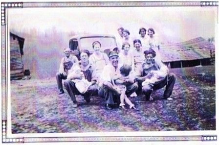 Sexton Family
This is a picture of the Sexton family at the homeplace.

From left to right in front; Troy Sexton (father), Charlie Fred  
Sexton holding baby, Baby unknown, Artie Sexton Weaver, Cone Sexton  
holding girl, Girl unknown, Hattie Sexton Reedy, Ola Clyde (John)  
Sexton Kilby, Dale Sexton holding baby, Baby unknown. In the back  left to right Reber (Ben) Sexton, Virginia (Jennie) Sexton Tucker,  Reva Sexton Hodge, and Martha Warren Sexton (mother).  Courtesy of Amber [email]amberbeth@gmail.com[/email]

