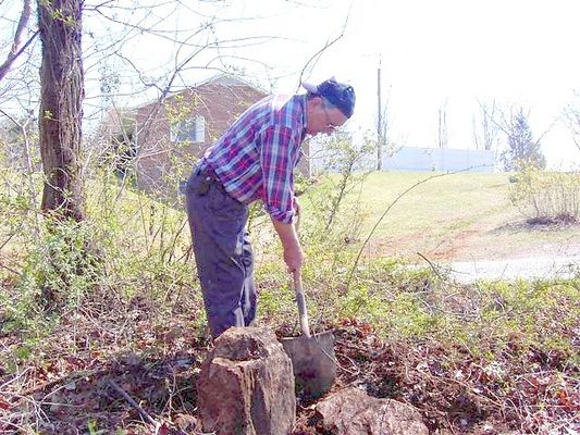 UncoveringtheRev.Warstone.JPG
Lou Kurtz working on uncovering a revolutionary war era grave.
