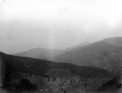 Tumbling Creek - Clinch Mountain
Clinch Mountains from gap south of Beartown Mountain. Distant sharp peak is Whiterock; high ridge at right is Redrock with dip slope of Clinch sandstone on left forming syncline with distant ridge. Abingdon quadrangle. Virginia. No date. From the US Geological Service

