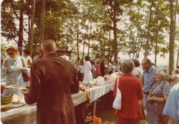 dinnerongrounds.jpg
This image shows part of the dinner on the grounds at Haw Orchard cemetery decoration, August 13, 1978,  Photo by Jeff Weaver
