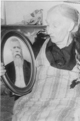 farmerlydia.jpg
This photo shows Lydia Thompson Farmer holding a photo of her late husband, Noah Farmer.  Lydia moved to Marion, VA after Noah died in 1930.  Courtesy of Anita Kay Wyatt.
