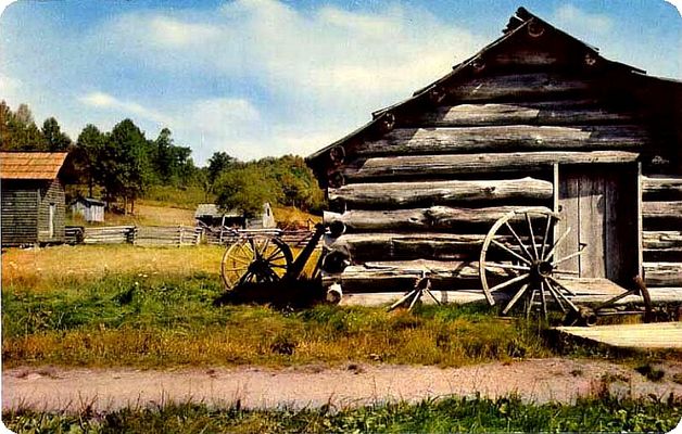 mabrymillblacksmithshop.jpg
More information can be found at this brief website about [url=http://www.brptrails.com/brp1762.htm]Mabry Mill[/url]. This is from a 1970s sytle postcard.
