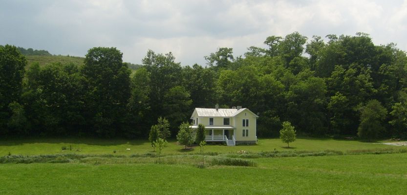 Grassy Creek - Recently Restored House
An example of mountain vernacular architecture is presented ere for your consideration.  This house is fairly typical of the late 19th and early 20th century farm house style.  Photo by Jeff Weaver, June 26, 2007.

