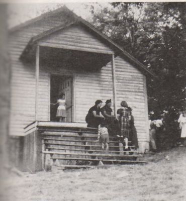 pondmtnchurch.jpg
This is a 1952 image of the church and some congregants on the porch.
