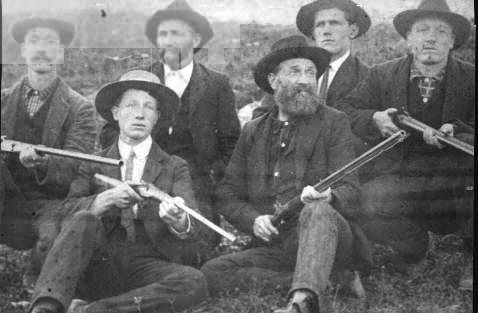 roberts1.jpg
Back row, left to right Garfield, Micajah, Glenn and Coy Roberts
Front row, Steve and Peter Kenly Roberts
The men holding guns are all Primitive Baptist Elders.  Courtesy of Thom Houk.
