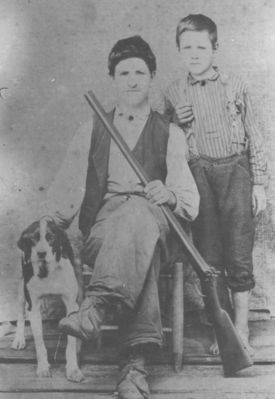 strugilljeike.jpg
Estil and Ike were sons of Joshua Sturgill and Phoebe Marilda Weaver Sturgill.  The dog's parents are unknown.  This photo was taken about 1898.  
