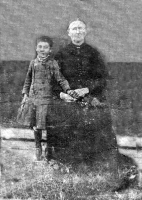 Perkins Mother and Child?
Here is an old "tintype" picture which was in with the Perkins bunch.  No idea who they are but am guessing this to be civil war era or somewhat later.   Courtesy of Cathy Bell [email]cjbell47@goldenwest.net[/email]


