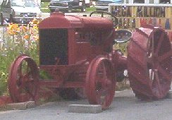 redtractor.jpg
This antique red tractor was sitting beside the road when I took the picture in the summer of 2003.
