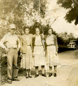 JohnLucilleGrannyFlorence.jpg
From left to right; John Johnson, Mrs. Lucille Hayden, Carrie Johnson and Florence Holmes. John, Lucille, and Florence were Carrie's children.  Courtesy of Lesa Long [email]ladygwenhwyvar@hotmail.com[/email]
