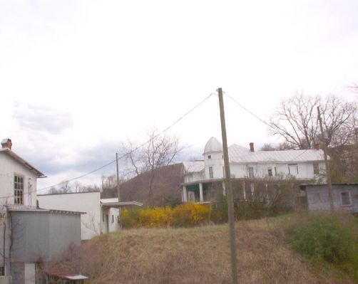 Mouth of Wilson - J. Cam Fields' Home
This photo shows the Fields homeplace at Mouth of Wilson, with part of the Fields store visible on the left.  Photo April 16, 2006 by Jeff Weaver
