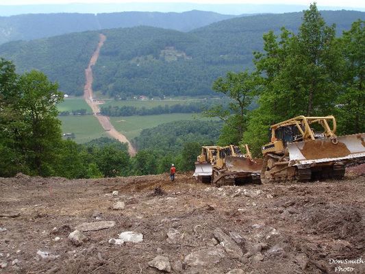 DUKEENERGYGASLINE035.jpg
LOOKING SOUTHEAST ACROSS THE LITTLE VALLEY / TANNERSVILLE AREA. THE GAS LINE WILL CROSS THE EAST END OF FLAT TOP MOUNTAIN...THEN CROSS TANNERSVILLE AND BRUSHY MOUNTAIN...CROSS RICH VALLEY AND THEN WALKER MOUNTAIN AND HOOK UP WITH THE EAST TENNESSEE GAS LINE NEAR I-81 BETWEEN CHILHOWIE AND MARION. THE LINE IS UNUSUAL IN THAT IT IS RUNNING NORTH-SOUTH. MOST FOLLOW THE VALLEY FLOORS IN A SOUTHWEST-NORTHEAST DIRECTION.
 
Courtesy of Don Smith [email]dsmith1043@comcast.net[/email]
