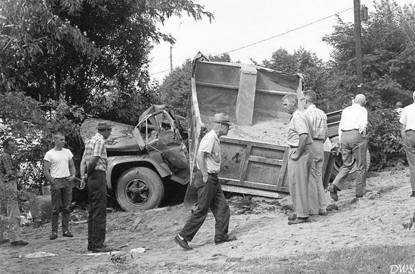 JULY22RUNAWAYDUMPTRUCK0868693.jpg
AUGUST 1968- DUMP TRUCK LOADED WITH SAND LOST BRAKES ABOVE OVERLOOK ON HWY 107 AND CAME INTO THE INTERSECTION WITH HWY 91...CROSSED THE ROAD AND WENT UP JOE VERNON'S DRIVEWAY...DEMOLISHED TWO VEHICLES IN THE DRIVEWAY AND THE DUMP TRUCK. TRUCK DRIVER INJURED.
 Courtesy of Don Smith [email]dsmith1043@comcast.net[/email]
