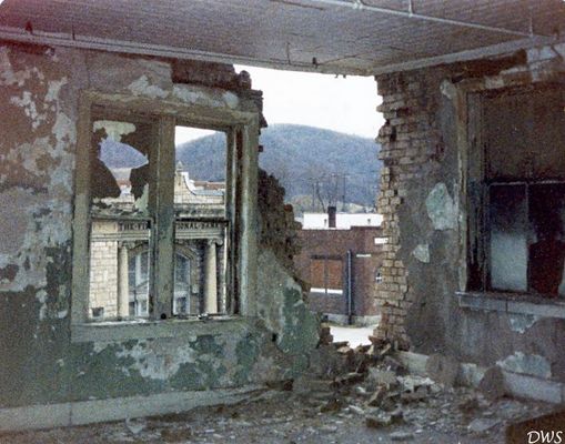 JULY24MGSJAN1980701.jpg
THIS IS WHAT THE MATHIESON GENERAL STORE LOOKED LIKE FROM THE INSIDE ON THE SECOND FLOOR JUST BEFORE IT WAS DEMOLISHED IN JANUARY OF 1980.
 
THE WEST SIDE FRONT CORNER BEGAN TO LOSE BRICKS AND FINALLY THE HOLE OPENED UP. THE STORE HAD BEEN CLOSED FOR SOME TIME. WORK HAD ALREADY LEVELED THE OLD SUPER X / IGA MARKET THAT HAD OPENED IN NOVEMBER OF 1955.
 
THE WALLS WERE SOLID BRICK...THREE WIDE. THEY BUILT IT WELL IN 1894.
 
Courtesy of Don Smith [dsmith1043@comcast.net[/email]
