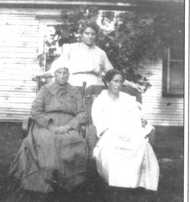 TobithaandMilliePerrySheets.jpg
Seated: Tobitha Ham Perry and daughter Millie Perry Sheets.  Standing: Ettie Sheets, daughter of Millie and Ellis Sheets.  Millie is holding Effie's son Mack Jay Sheets.  Effie was married to Avery Sheets.  Courtesy of Mary Ann Talbott [email]matalbott@seidata.com[/email]
