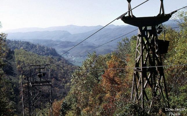 bucketline101968.jpg
NEARING THE END...THE BUCKET LINE... SHOWN HERE HEADING FOR THE ANGLE JUNCTION, WOULD SOON BE SHUT DOWN FOREVER. IT HAD A 66 YEAR RUN. MATHIESON HAD BUILT IT IN 1902. TRUCKS REPLACED THE BUCKET LINE FOR THE FEW REMAINING YEARS BEFORE OLIN CEASED PRODUCTION IN 1972.  Courtesy of Don Smith [email]dsmith1043@comcast.net[/email]
 

