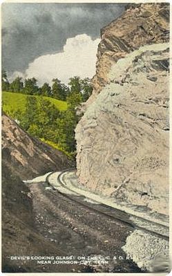 Johnson City - Devil's Looking Glass
This 1930s postcard shows a rock formation known as the Devil's Looking Glass with the CC&O Railroad in the foreground.
