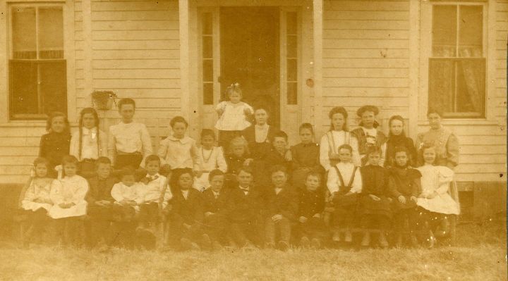 heltonss.jpg
This is a Sunday school photo, probably taken around 1915 if the woman sitting top center with her arm draped over the shoulder of a big-eared son is, indeed, Ada Littlewood Francis (oldest son had stick-out ears). The picture was taken on the front steps of Herbert and Hannah Littlewood's home on Helton Creek.  Courtesy of Emily Kilby.


