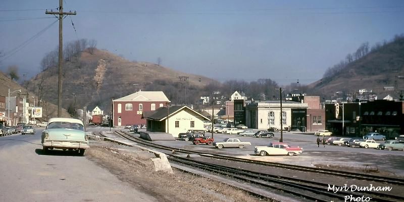 Saltville March 1964
This March 1964 photo shot looking east from Main Street, shows the company store in the center of the shot (red building), the train depot slightly to the left, and the bank further to the left.  Courtesy of Don Smith [email]dsmith1043@comcast.net[/email]
