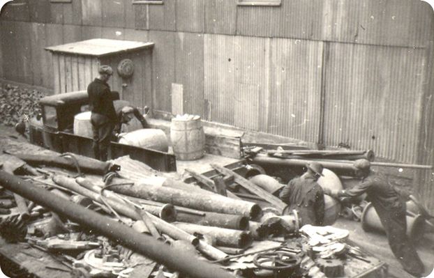 porterworkersbarrel.jpg
Photo by John Porter, courtesy of Doug Ogle, showing workers cleaning up debris, 1937-40.
