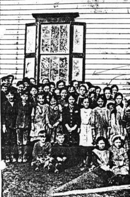 schkidsgrassycrk.jpg
My grandmother Rosa May Reeves is in this picture. She was born in 1900, so I figure this picture to be taken around 1908. This school is in Grassy Creek.  Courtesy of Bill Payne.
