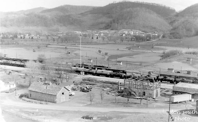 wellfields31965.jpg
BARN AT LEFT WOULD BECOME THE SALT KETTLE THEATRE IN 1973.  BUILDING BEING RAZED IS AN OLD SALT HOUSE BUILT ON THE SITE OF THE GEORGIA SALT FURNACE. IT WAS USED FOR STORING SACKS AND BARRELS WHEN IT WAS A SALT HOUSE.  WHEN IT WAS NO LONGER USED AS A SALT HOUSE, THE TOP FLOOR SERVED AS THE MEETING PLACE FOR WILLIAM KING MASONIC LODGE NO. 227 FROM 1901 UNTIL A NEW MASONIC LODGE WAS BUILT IN DOWNTOWN IN 1949. THE BOTTOM FLOOR WAS USED BY MATHIESON.
 
THE BUILDING AT RIGHT IS THE OLD AXTON CROSS LOADING TERMINAL.  

Courtesy of Don Smith [email]dsmith1043@comast.net[/email]

