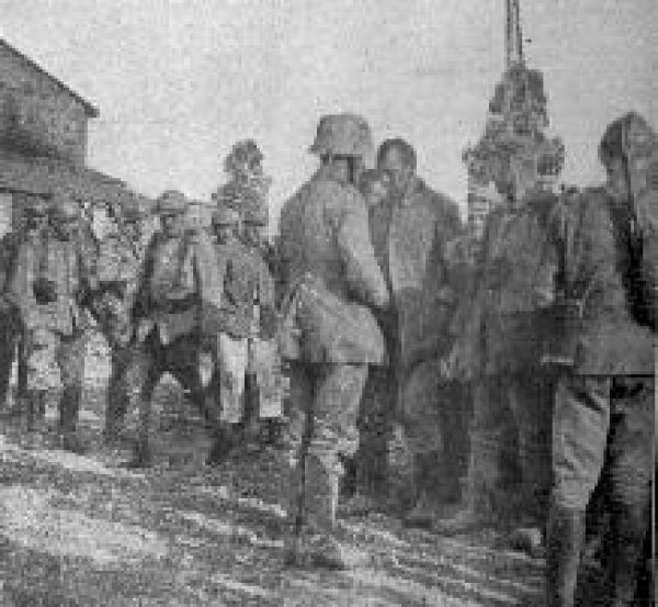 PRISONERS CAPTURED AT VERDUN"All the French poilus flocked around and cut the buttons off the prisoners clothes for souvenirs. They also took the helmets away from any who had them."